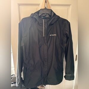 Columbia youth black raincoat in size XL.